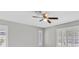 Bedroom with ceiling fan and plantation shutters allowing for privacy at 814 Singing Drum Dr, Henderson, NV 89002