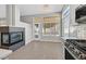Bright kitchen showcasing stainless steel appliances, modern backsplash, eat-in island and contemporary finishes at 814 Singing Drum Dr, Henderson, NV 89002