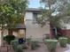 Well-maintained condo exterior showcasing stairs, landscaping, and a clean facade at 908 Duckhorn Ct # 102, Las Vegas, NV 89144