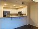 Kitchen featuring granite countertops and stainless steel appliances at 908 Duckhorn Ct # 102, Las Vegas, NV 89144