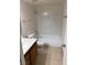 Bathroom with a tub and shower combination, vanity, and toilet at 925 Falconhead Ln # 102, Las Vegas, NV 89128