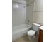 Bathroom with a shower, toilet, and vanity at 925 Falconhead Ln # 102, Las Vegas, NV 89128