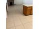 Spacious living room with tile flooring and a cozy fireplace at 925 Falconhead Ln # 102, Las Vegas, NV 89128