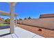 Backyard featuring a covered patio, rock landscaping, and privacy wall at 975 Leadville Meadows Dr, Henderson, NV 89052