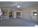 Large bedroom with archways leading to other rooms in a carpeted open concept at 975 Leadville Meadows Dr, Henderson, NV 89052