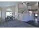 Open dining area near the staircase featuring hardwood floors at 975 Leadville Meadows Dr, Henderson, NV 89052