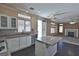 Bright kitchen featuring an island and stainless steel appliances open to the living room at 975 Leadville Meadows Dr, Henderson, NV 89052