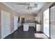 Modern kitchen with an island, stainless steel appliances, and hardwood floors at 975 Leadville Meadows Dr, Henderson, NV 89052