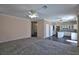 Open concept living room and kitchen, with sleek floors and an island at 975 Leadville Meadows Dr, Henderson, NV 89052