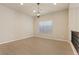 Well-lit bedroom with a large window, pendant lighting, and hardwood floors at 9853 Russian Hill St, Las Vegas, NV 89141