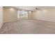 Expansive bonus room with neutral carpet, tray ceilings and recessed lighting at 9853 Russian Hill St, Las Vegas, NV 89141