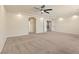 Large bonus room featuring neutral carpeting and multiple entryways to other areas at 9853 Russian Hill St, Las Vegas, NV 89141