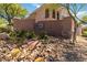 Entrance to Beacon Hill with stone wall and attractive landscaping at 10013 Sable Point St, Las Vegas, NV 89178