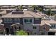 Overhead exterior view of a townhome with multiple windows and attached balconies at 10013 Sable Point St, Las Vegas, NV 89178
