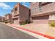 Exterior view of garages with brick-paved driveways in a well-maintained community at 10013 Sable Point St, Las Vegas, NV 89178