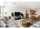 Spacious living area connecting seamlessly to the dining and kitchen areas at 10013 Sable Point St, Las Vegas, NV 89178