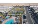 Aerial shot of community amenities with a pool, park, and residential area at 12237 Plum Mist Ct # 4, Las Vegas, NV 89183