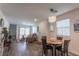 Open-concept living room and dining area boasts natural light and seamless flow at 12237 Plum Mist Ct # 4, Las Vegas, NV 89183