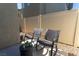 Private patio with outdoor seating, perfect for relaxing and enjoying the fresh air at 12237 Plum Mist Ct # 4, Las Vegas, NV 89183