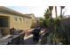 Cozy backyard patio features a dining area and grill, perfect for outdoor entertaining and relaxation at 1504 Andrew David Ave, North Las Vegas, NV 89086