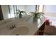 Bright bathroom featuring a soaking tub at 1504 Andrew David Ave, North Las Vegas, NV 89086