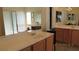 Bright bathroom featuring dual sinks, bathtub, and separate shower with natural light at 1504 Andrew David Ave, North Las Vegas, NV 89086