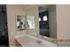 Bright bathroom featuring a vanity and mirror at 1504 Andrew David Ave, North Las Vegas, NV 89086
