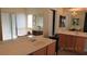 Bright bathroom featuring dual sinks, bathtub, and separate shower with natural light at 1504 Andrew David Ave, North Las Vegas, NV 89086