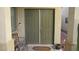 Inviting double front door with sidelight, bench, and 'welcome' mat at 1504 Andrew David Ave, North Las Vegas, NV 89086
