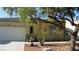 Charming single story home featuring xeriscaping, desert landscaping, and a two-car garage at 1504 Andrew David Ave, North Las Vegas, NV 89086