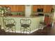 Charming eat-in kitchen featuring granite countertops, wood cabinets, and stainless appliances at 1504 Andrew David Ave, North Las Vegas, NV 89086