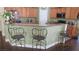 Charming eat-in kitchen featuring granite countertops, wood cabinets, and stainless appliances at 1504 Andrew David Ave, North Las Vegas, NV 89086