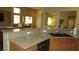 Kitchen sink and granite countertops in a brightly lit open concept home and living space at 1504 Andrew David Ave, North Las Vegas, NV 89086