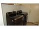 Modern front-load washer and dryer set in a dedicated laundry area at 1504 Andrew David Ave, North Las Vegas, NV 89086