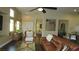 Cozy living room with hardwood floors, a comfortable leather sofa, and lots of natural light at 1504 Andrew David Ave, North Las Vegas, NV 89086