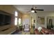 Spacious living room with ceiling fan, recessed lighting, and an open layout at 1504 Andrew David Ave, North Las Vegas, NV 89086