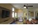 Spacious living room with ceiling fan, recessed lighting, and an open layout at 1504 Andrew David Ave, North Las Vegas, NV 89086