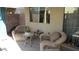 Cozy patio area with comfortable seating and a small table at 1504 Andrew David Ave, North Las Vegas, NV 89086