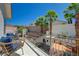 Balcony with cozy seating area overlooking the play area at 189 Andada Dr, Henderson, NV 89012