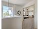 View of bedroom through a doorway; plush carpeting, neutral colors, and natural light at 189 Andada Dr, Henderson, NV 89012