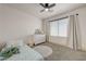 Bedroom with neutral walls, carpet flooring, and a large window at 189 Andada Dr, Henderson, NV 89012