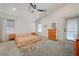 Light-filled main bedroom with ample space, ensuite bathroom, and large windows at 189 Andada Dr, Henderson, NV 89012