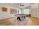 Bright game room with modern ceiling fan, a pool table, and wood-style flooring at 189 Andada Dr, Henderson, NV 89012