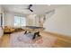 Bright game room with modern ceiling fan, a pool table, and wood-style flooring at 189 Andada Dr, Henderson, NV 89012