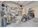 Well-organized garage with pegboard, tools, storage shelves and ample workspace at 189 Andada Dr, Henderson, NV 89012