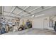 Organized garage with pegboard for tools, storage shelves and overhead lighting at 189 Andada Dr, Henderson, NV 89012