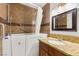 Bathroom featuring granite countertop, vanity, accessible tub, and tiled shower at 1901 Manhattan Dr, Las Vegas, NV 89106