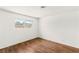 A bright bedroom with hardwood floors and view to the back yard at 1901 Manhattan Dr, Las Vegas, NV 89106