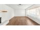 Bright living room featuring hardwood floors, neutral paint, and a large window at 1901 Manhattan Dr, Las Vegas, NV 89106