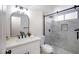 Bright bathroom features a glass enclosed shower with stylish white marble tiling at 2204 Brighton Shore St, Las Vegas, NV 89128